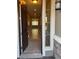 Inviting home entrance with sidelight window and decorative stone accent wall at 4108 Fairywren Dr, North Las Vegas, NV 89031