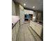 Bright kitchen showcases double ovens, ample counter space, and streamlined white cabinets at 4108 Fairywren Dr, North Las Vegas, NV 89031