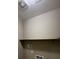 Laundry room featuring a long shelf for storage and hookups for a washer and dryer at 4108 Fairywren Dr, North Las Vegas, NV 89031