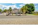 Community playground featuring slides, climbing structures, and playground equipment at 412 Orchid Oasis Ave, North Las Vegas, NV 89031