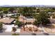 This spacious single-story home boasts a swimming pool, desert landscaping, and views of Las Vegas at 4219 E Pinecrest Cir, Las Vegas, NV 89121