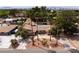 Spacious single-story home boasting a swimming pool and lush landscaping with desert accents at 4219 E Pinecrest Cir, Las Vegas, NV 89121