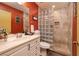 Stylish bathroom with glass block shower, updated vanity, and modern fixtures at 4219 E Pinecrest Cir, Las Vegas, NV 89121