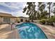 Sparkling pool features mature landscaping and offers a private backyard oasis, ideal for relaxing and entertaining at 4219 E Pinecrest Cir, Las Vegas, NV 89121