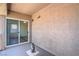 A balcony with sliding glass doors offers an indoor/outdoor living experience at 4725 Basilicata Ln # 204, North Las Vegas, NV 89084