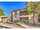 Apartment building with balconies, landscaped grounds, and walkway at 4725 Basilicata Ln # 204, North Las Vegas, NV 89084