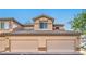 Townhome featuring attached garage and tile roof at 4725 Basilicata Ln # 204, North Las Vegas, NV 89084