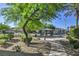 Community park featuring a gazebo, playground, and walking path at 4725 Basilicata Ln # 204, North Las Vegas, NV 89084
