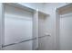 Walk-in closet featuring built in shelving and racks for storage and organization at 4725 Basilicata Ln # 204, North Las Vegas, NV 89084