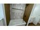 Bathroom featuring updated vanity, decorative tile, and new fixtures at 5239 Treasure Ave, Las Vegas, NV 89122