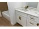 Updated bathroom with new vanity, countertop, modern faucet, and tub at 5239 Treasure Ave, Las Vegas, NV 89122