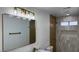 Bathroom features updated fixtures, marble countertop and step-in shower at 5239 Treasure Ave, Las Vegas, NV 89122