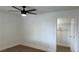 A bright bedroom with a ceiling fan and closet at 5239 Treasure Ave, Las Vegas, NV 89122