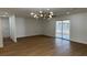 Spacious living room featuring sliding glass doors to the backyard at 5239 Treasure Ave, Las Vegas, NV 89122