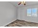Bedroom featuring closet space, hardwood floors, and a window at 5425 Pride Mountain St, North Las Vegas, NV 89031