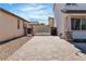 A brick driveway extends to a secure gate, offering privacy and convenience at 5425 Pride Mountain St, North Las Vegas, NV 89031