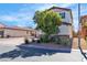 This two-story home features well-maintained landscaping and convenient street parking at 5425 Pride Mountain St, North Las Vegas, NV 89031
