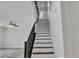 Stairway featuring white walls and wooden steps at 5425 Pride Mountain St, North Las Vegas, NV 89031