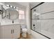 Well-lit bathroom featuring a glass shower door and updated fixtures at 56 Belle Ridge Ave, Las Vegas, NV 89123