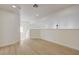Bonus room featuring all white color and light wood flooring at 56 Belle Ridge Ave, Las Vegas, NV 89123
