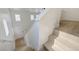 Bright staircase leading to the second level, featuring light wood steps at 56 Belle Ridge Ave, Las Vegas, NV 89123