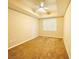 A basic bedroom with carpeted floors, tray ceiling, and neutral walls at 62 E Serene Ave # 115, Las Vegas, NV 89123