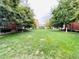 Large grass-covered common area in the community offers beautiful green space at 62 E Serene Ave # 115, Las Vegas, NV 89123
