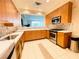 Well-equipped kitchen with stainless steel appliances and ample counter space at 62 E Serene Ave # 115, Las Vegas, NV 89123