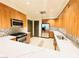 Spacious kitchen features stainless steel appliances and a breakfast bar at 62 E Serene Ave # 115, Las Vegas, NV 89123