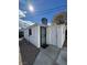 Exterior back view of the home, with a gravel ground covering at 621 S 9Th St, Las Vegas, NV 89101