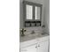 Stylish bathroom features a vanity with storage, a decorative mirror, and great lighting at 621 S 9Th St, Las Vegas, NV 89101