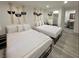 Modern bedroom with dual beds and an attached bathroom at 621 S 9Th St, Las Vegas, NV 89101