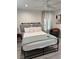 A cozy bedroom with a modern platform bed, soft lighting, and decor creates a calm, inviting space at 621 S 9Th St, Las Vegas, NV 89101