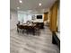 Open-concept living and dining area with seating, stylish decor, and lots of natural light at 621 S 9Th St, Las Vegas, NV 89101