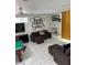The living room boasts a fireplace, modern decor, comfortable seating, and lots of natural light at 621 S 9Th St, Las Vegas, NV 89101