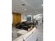 Open-concept living space featuring modern furnishings, a dining area, and a view into the kitchen at 621 S 9Th St, Las Vegas, NV 89101
