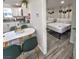 Open concept of the kitchen/dining and bedroom areas with light grey plank flooring at 621 S 9Th St, Las Vegas, NV 89101