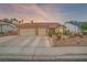 Charming single-story home featuring desert landscaping, a three-car garage, and well-maintained architecture at 6508 Peppermill Dr, Las Vegas, NV 89146