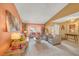 Bright and airy living room with plush seating, a decorative mirror, and ample natural light at 6508 Peppermill Dr, Las Vegas, NV 89146