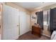 A cozy bedroom featuring a window for natural light and a convenient storage closet at 6529 Hartwood Rd, Las Vegas, NV 89108