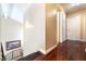 Hallway boasts hardwood floors, staircase, and access to various rooms at 6529 Hartwood Rd, Las Vegas, NV 89108