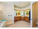 Contemporary bathroom featuring a corner vanity with double sinks, a shower, and ample lighting at 6841 Longmeadow Dr, Pahrump, NV 89061