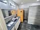 Modern bathroom with a double vanity, sleek tile work, a luxurious sauna and glass-door shower at 7035 Thistle Ridge St, Las Vegas, NV 89166