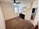 Simple and uncluttered bedroom featuring a window, shelving, and a neutral carpet at 7035 Thistle Ridge St, Las Vegas, NV 89166