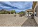 Low-maintenance backyard with desert landscaping, offering a peaceful outdoor space at 7465 Widewing Dr, North Las Vegas, NV 89084