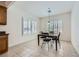 Bright dining area with large windows providing ample natural light and views of the outdoors at 7465 Widewing Dr, North Las Vegas, NV 89084