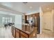 Well-appointed kitchen with stainless steel appliances, granite countertops, and ample cabinet space at 7465 Widewing Dr, North Las Vegas, NV 89084