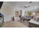 Bright living room with an open layout and direct access to the kitchen at 7606 Grove Acre Ct, Las Vegas, NV 89131