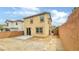 Backyard featuring a patio, garden space, and a neutral-colored exterior at 7815 Shingle Beach St, Las Vegas, NV 89166
