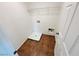 Laundry room featuring tiled floors, shelving, and hookups at 7815 Shingle Beach St, Las Vegas, NV 89166
